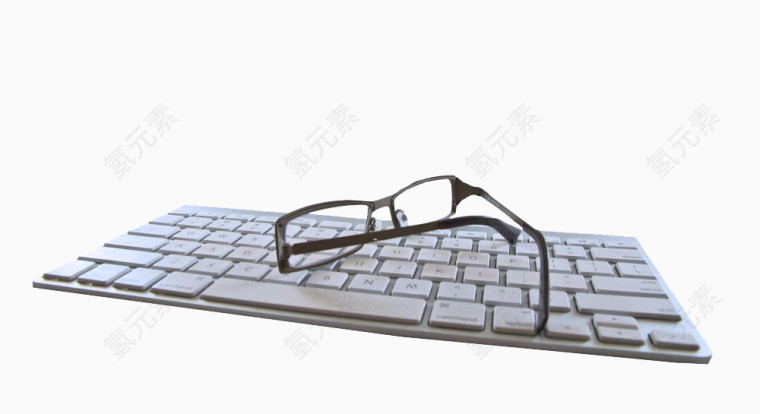 键盘上的眼镜图片