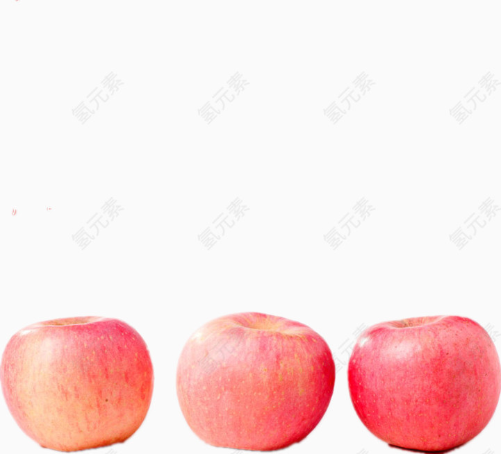 三颗独立摆放的苹果