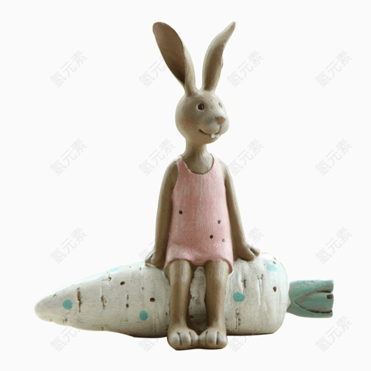 小兔子坐在胡萝卜上