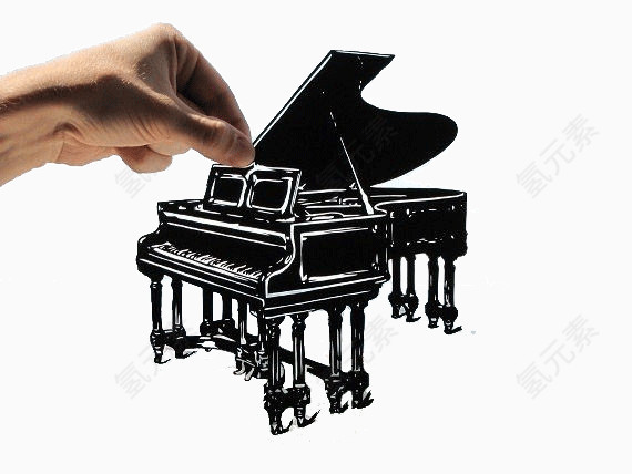 手中的钢琴创意剪纸艺术